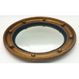A Regency style gilt wood convex wall mirror, 48cm diameter