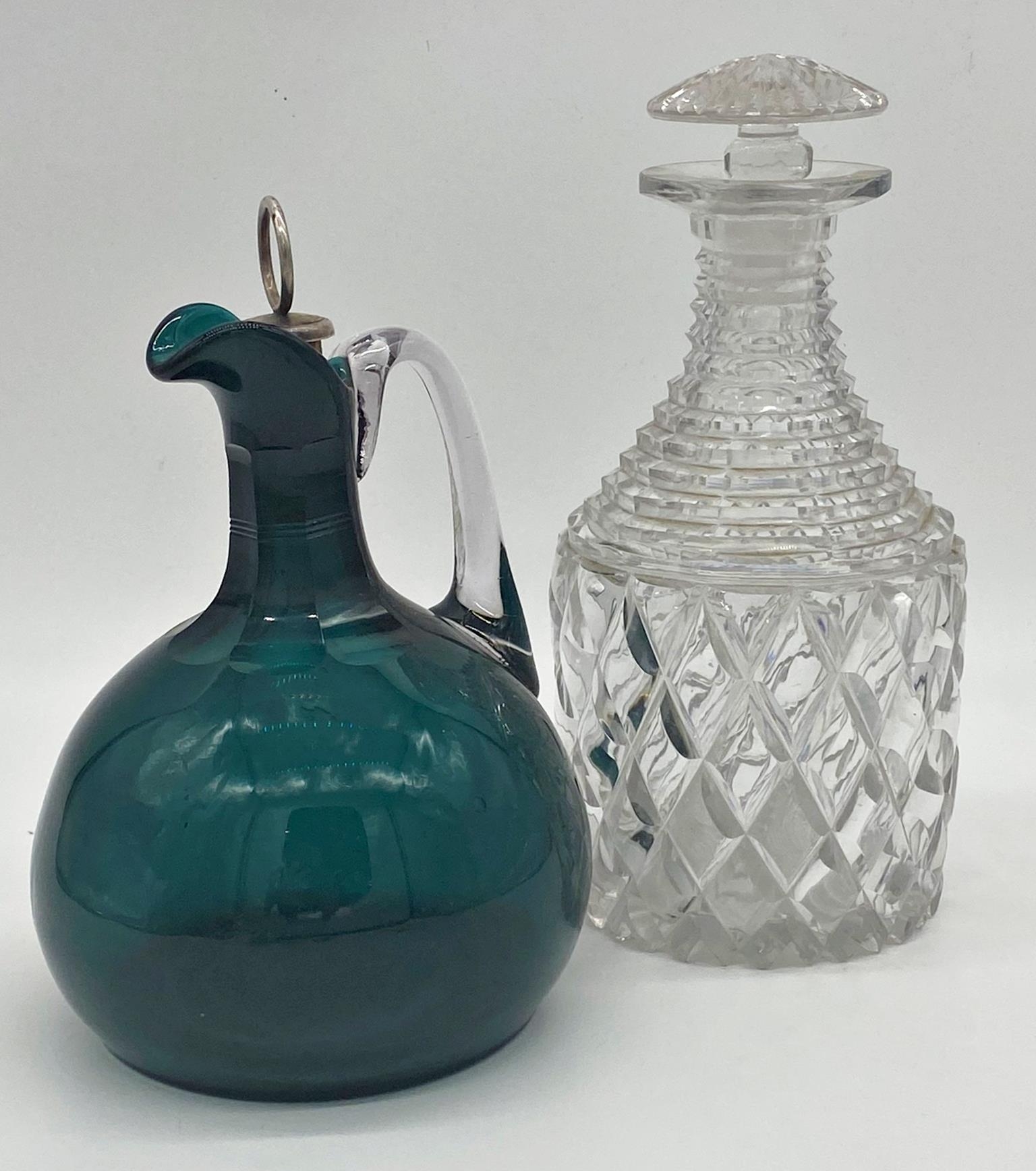 Good quality stepped cut glass decanter with stopper, 25cm high together with a further cut