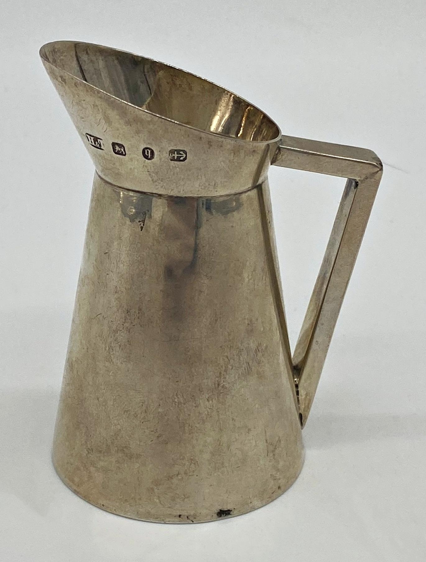 Novelty silver jug in the form of a traditional enamel jug, maker Hilliard & Thomason, Birmingham