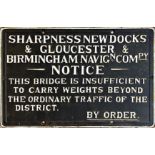 Old cast iron sign inscribed 'Sharpness New Docks & Gloucester & Birmingham Navigation Company,