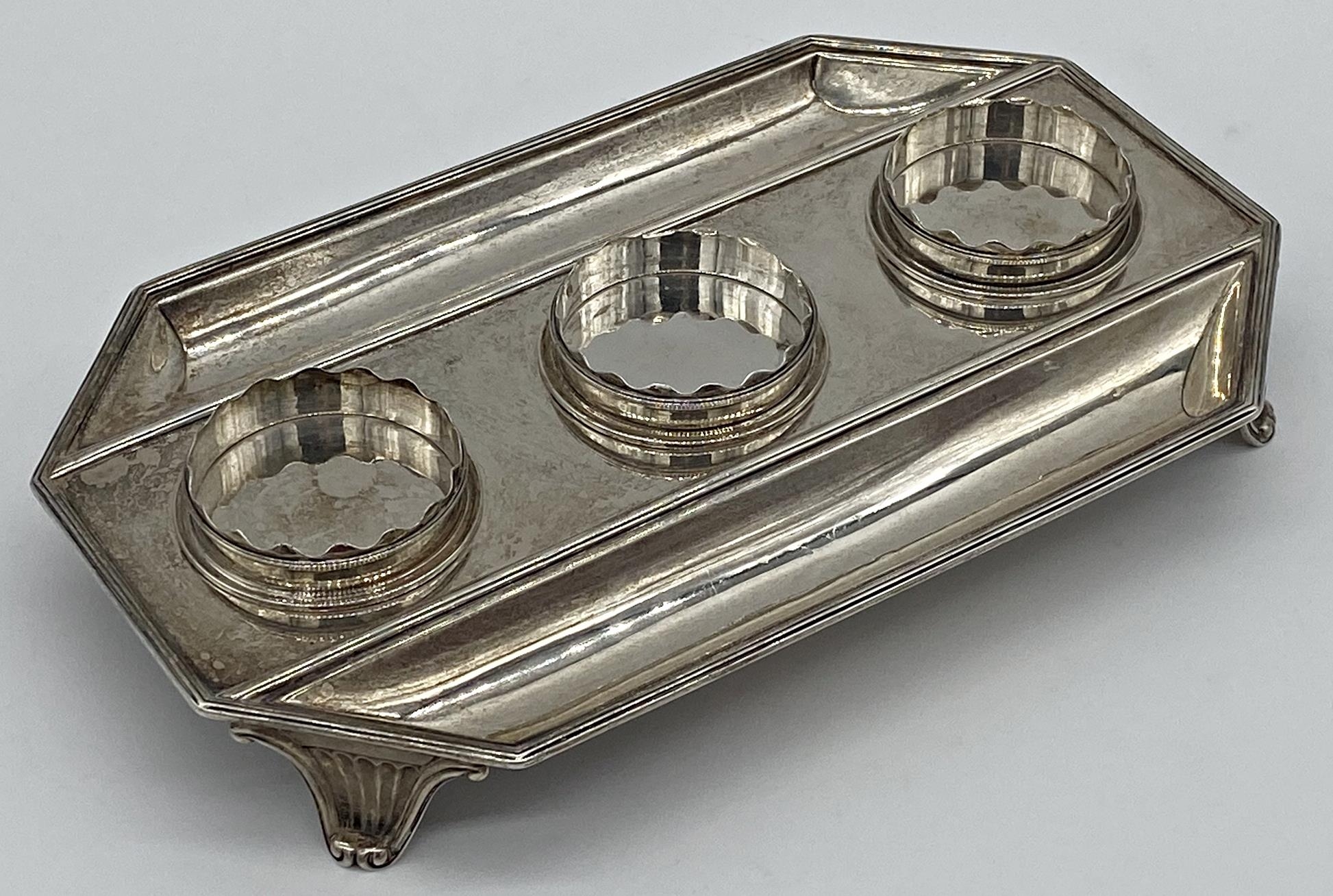 George III silver desk standish, with three wells for ink and twin pen holder, maker William