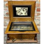 Good quality early 20th century walnut and kingwood music box, the lid with relief decoration of