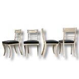 4 Empire style painted side chairs with navy leather upholstery on sabre front legs