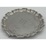 1920s silver salver, pie crust rim, with engraved inscription, maker marks worn, London 1928, 21cm
