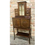Good early 20th century exhibition quality cabinet, raised glazed back flanked by six small drawers,