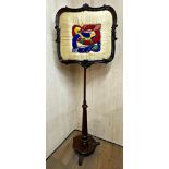 William IV rosewood polescreen, stitched with Arts and Crafts type fish. 160cm high