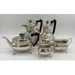 Early 20th century Walker and Hall silver boat shaped five piece tea service, teapot, coffee pot,