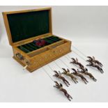 'Ascot, the new racing game', by Jaques and Son of London, the oak case fitted with eight lead