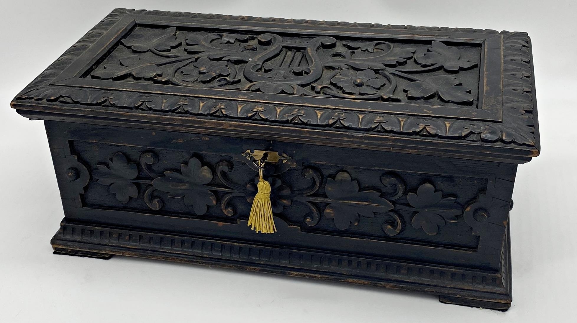 Late 19th century Swiss carved music box, the lid carved with lyre and scrolled foliage in a darted - Image 3 of 3