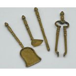 Set of four miniature brass fire tools, 13cm long approx. (4)