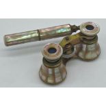 Pair of mother of pearl opera glasses by Louis Baque, Monte Carlo with hinged holder
