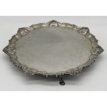 Good quality early 20th century cast silver salver, wavy scallop shell pie crust rim, maker