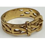 A 9ct gold Celtic design pierced work buckle ring stamped 375. Size S 1/2 weight 4.1 grams approx.