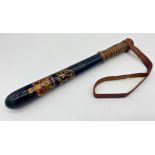 Victorian painted police truncheon with typical crown and VR monogram with leather strap, 38cm long