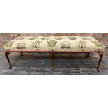 Georgian style window seat or foot stool with geometric tea pot upholstery upon six cabriole legs,