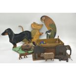 Collection of wooden cut-out playful vintage characters to include a pot stand mounted by a