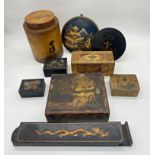 A collection of various eastern treen to include a tea canister, two circular panels with