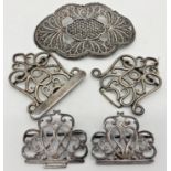 Two antique silver buckles with scrolled pierced decoration, with a further good filigree silver