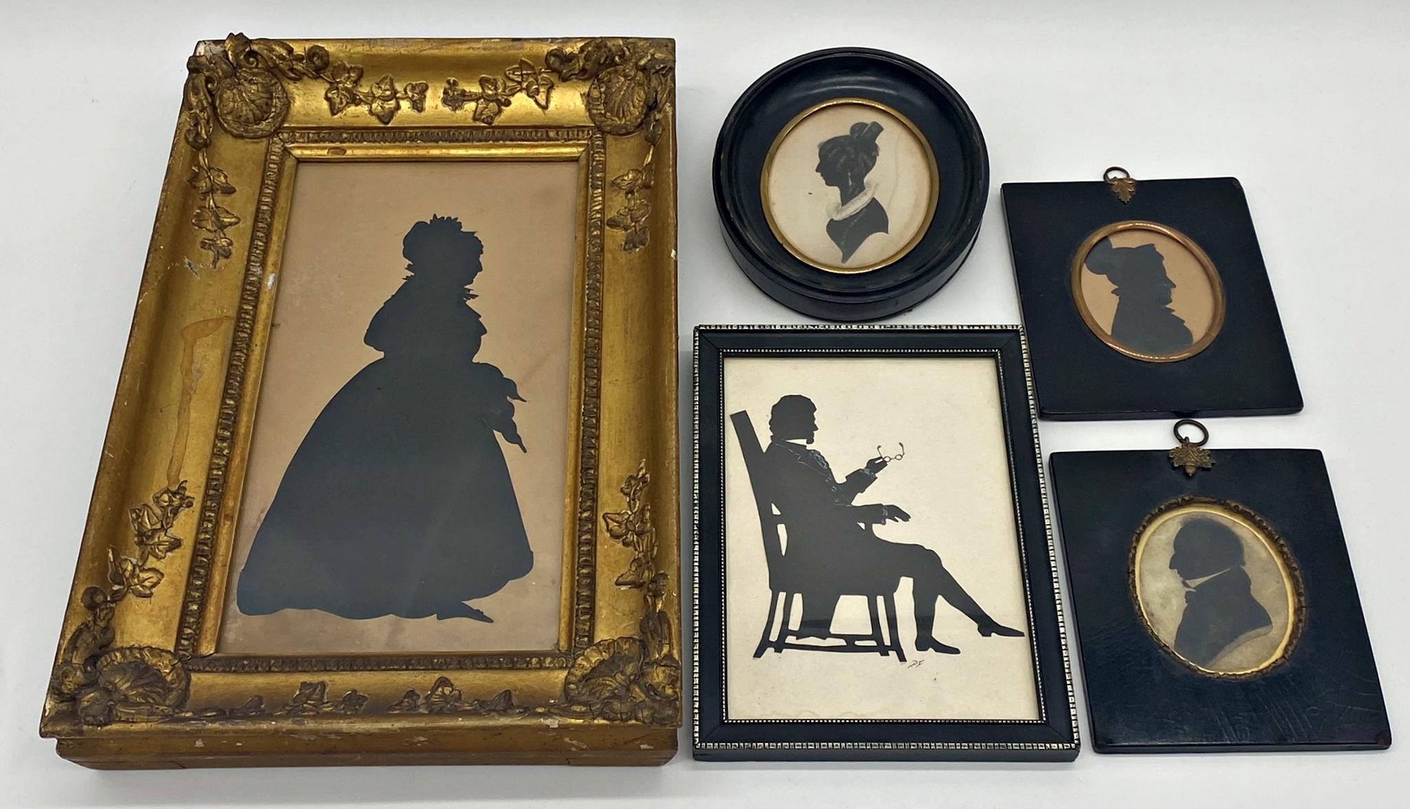 19th century school - Five silhouette pictures to include a large gilt framed example of an