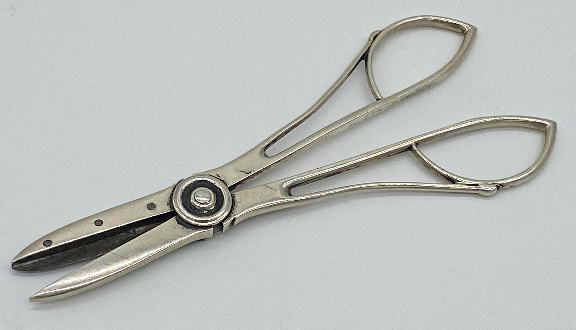 Pair of Secessionist style grape scissors marked sterling