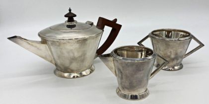 Art Deco silver three piece tea service, teapot, milk jug and sugar bowl of tapered conical form,