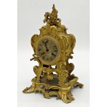 Impressive French cast ormolu rococo mantle clock, the twin train movement with silver dial,