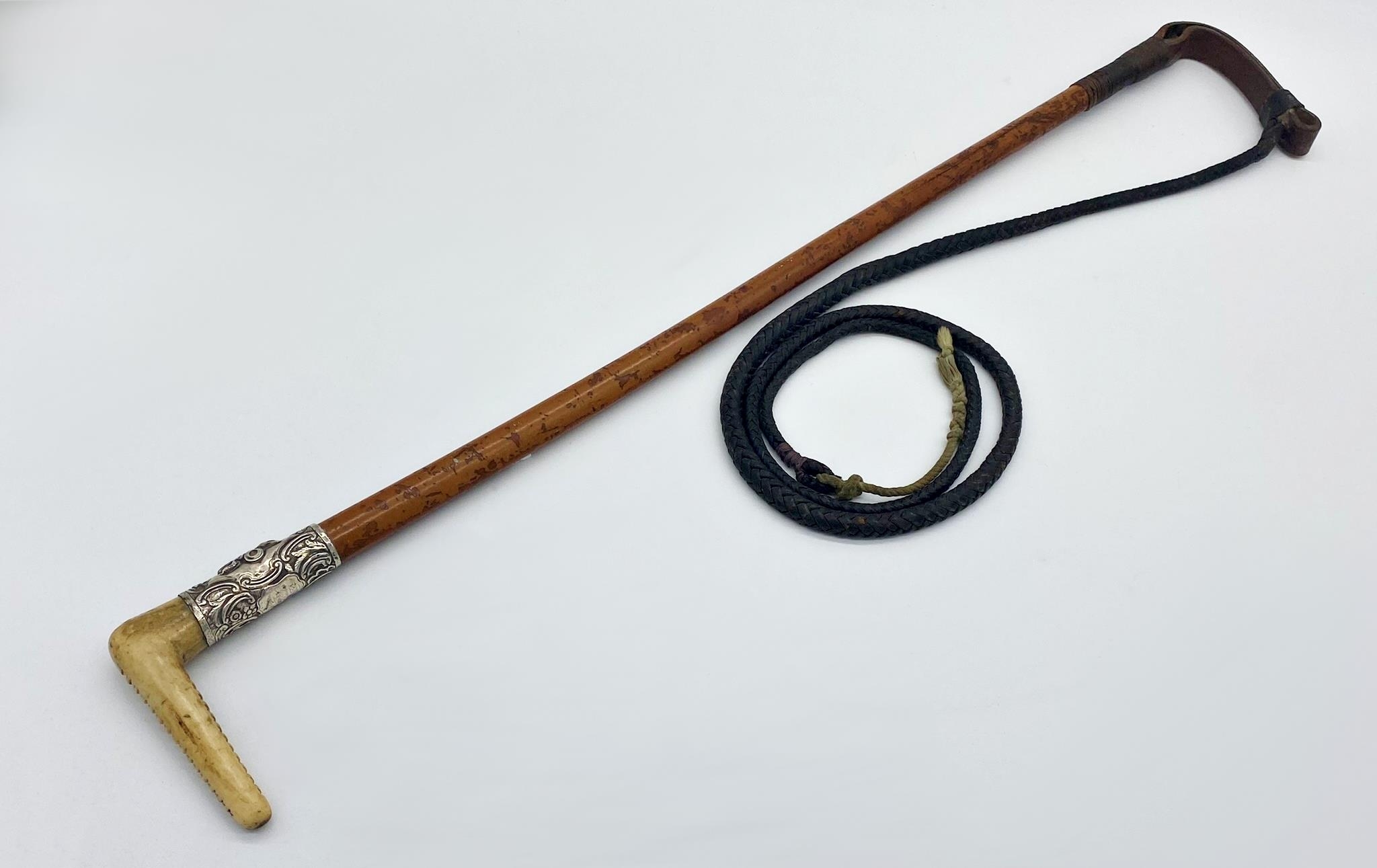 Exceptional quality early 20th century Malacca horn handled riding whip with silver collar