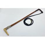 Exceptional quality early 20th century Malacca horn handled riding whip with silver collar