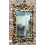 Georgian gilt wood and gesso Florentine wall mirror with original pitted glass, decorated pierced
