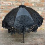 Good turn of the century parasol with carved wooden handle and gilt column, 92cm long