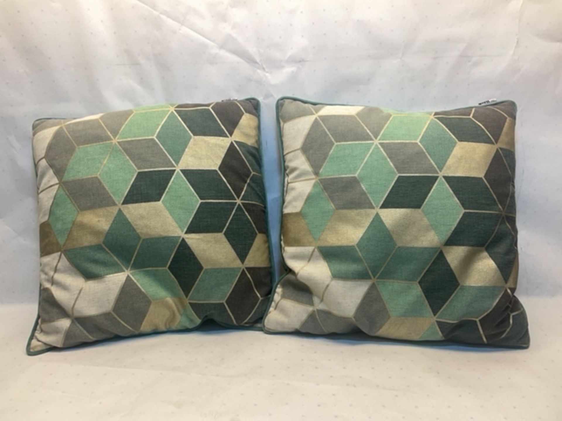 2 X Green Cushions with Geometric Pattern on Front