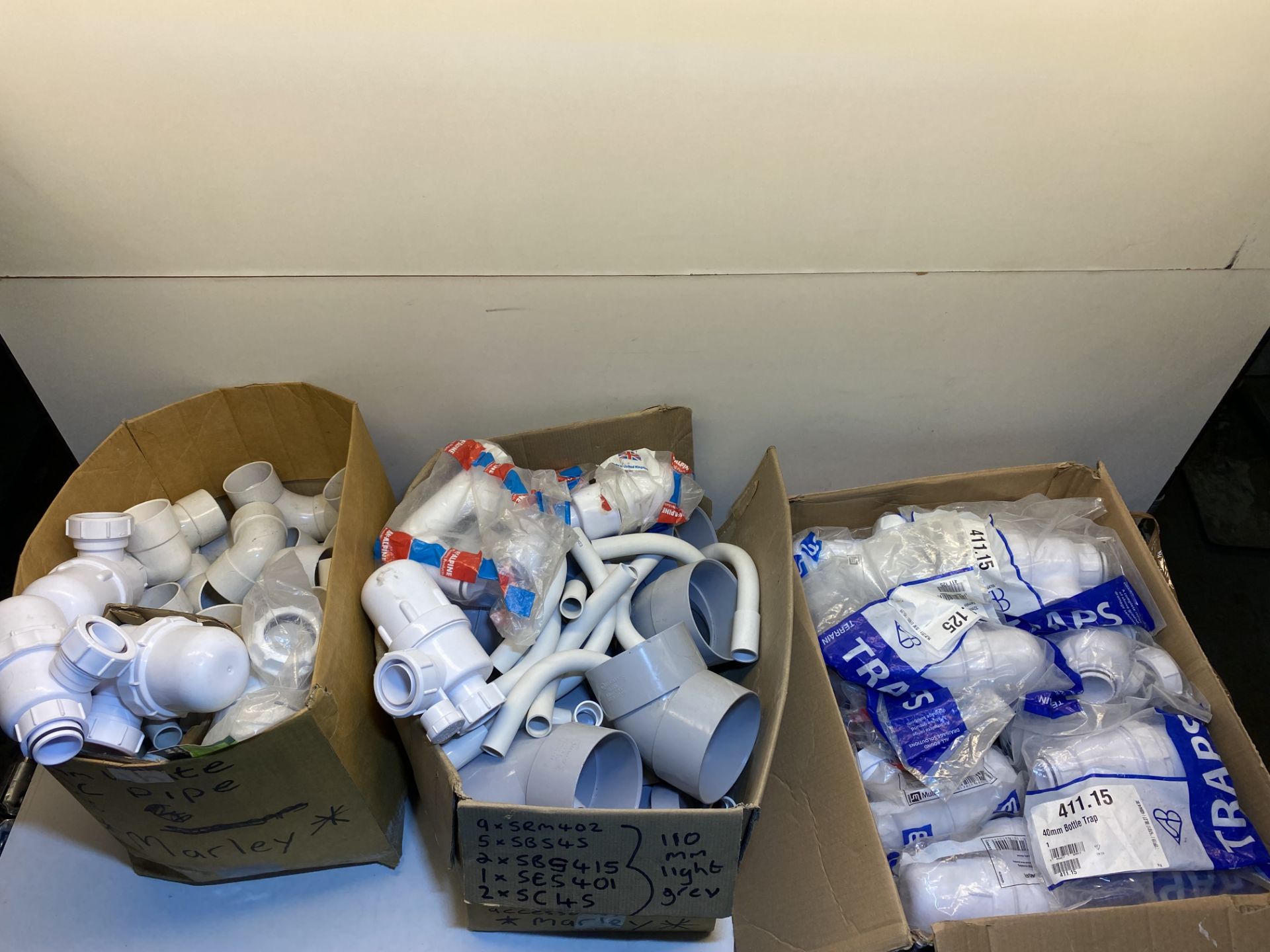 Quantity Of Various Plastic Pipe Fittings As Seen In Photos