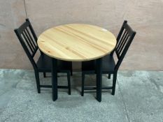 Round Wooden Table and 2x Black Wooden Chairs