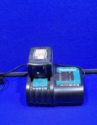 1 x Makita DC18SD Charger And BL105OB Battery