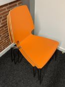 7 x Orange Stacking Chairs