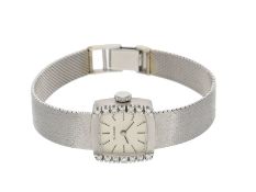 Armbanduhr: dekorative und elegante vintage Damenuhr von Dugena mit Diamantbesatz, 14K Weißgold
