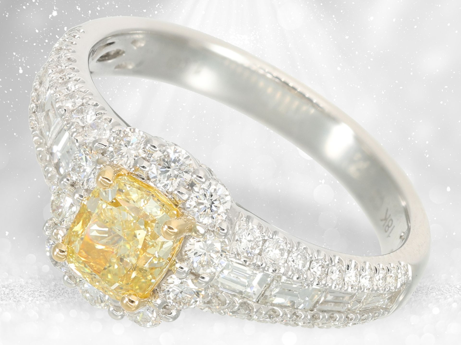 Ring: elaborately designed diamond ring, centre stone Fancy Yellow 1ct, GIA certificate