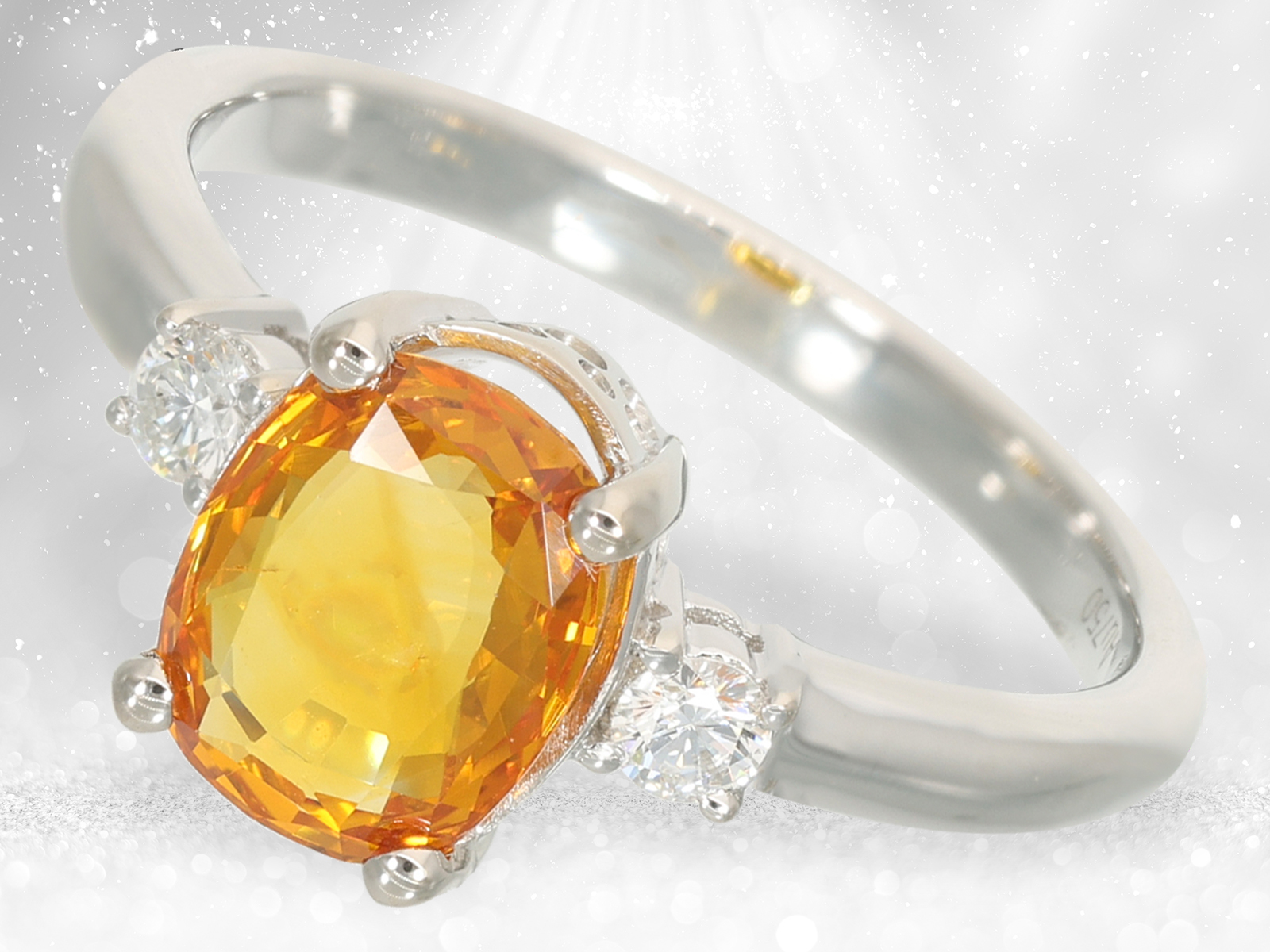 Unworn white gold goldsmith's ring with orange/yellow sapphire and brilliant-cut diamonds