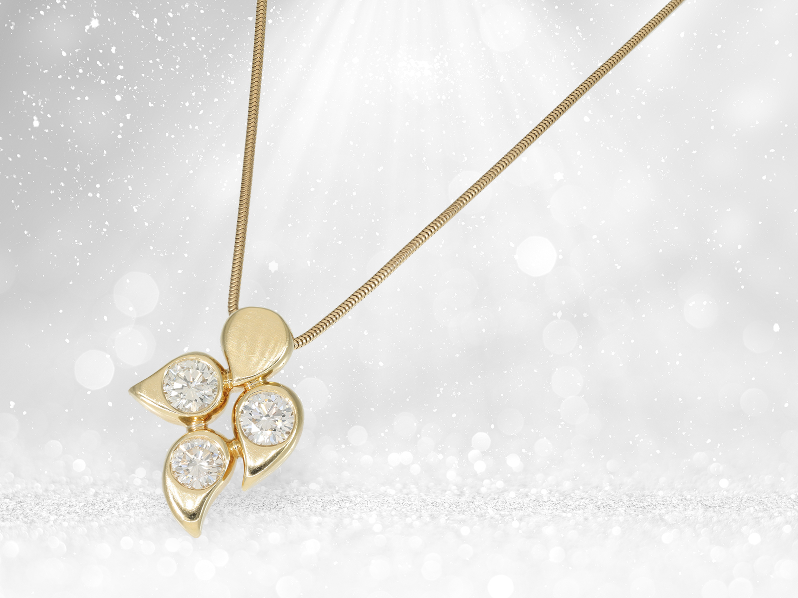 Gold snake chain with handmade brilliant-cut diamond gold pendant in floral design, approx. 2.18ct