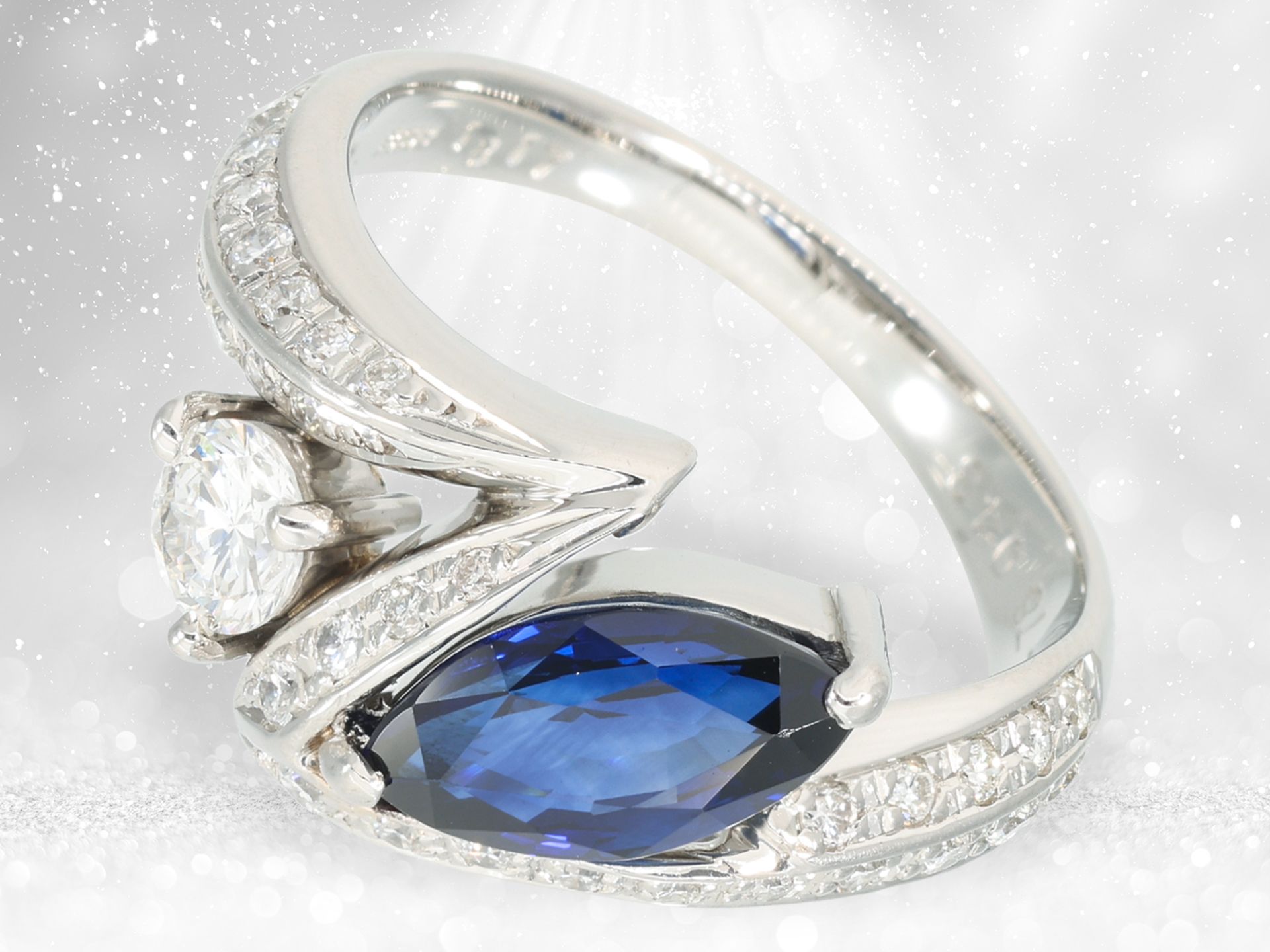 Ring: like new designer ring made of platinum "flash", very fine sapphire and brilliant-cut diamonds