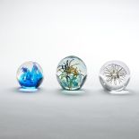 3 unterschiedliche Paperweights.