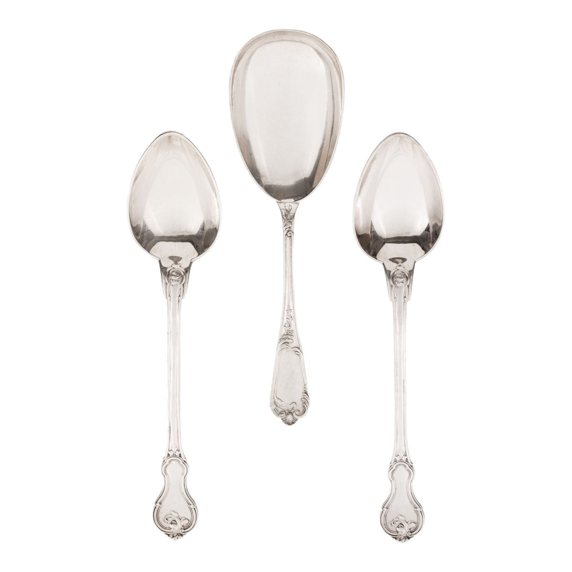 Three large serving spoons