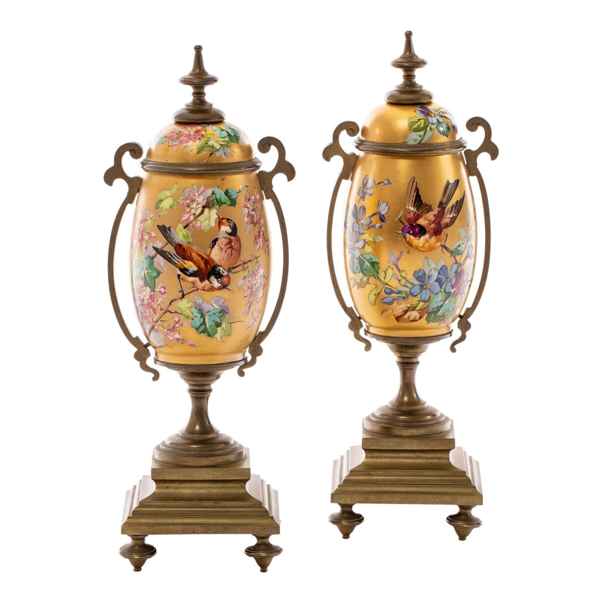 Pair of decorative vases with gold background
