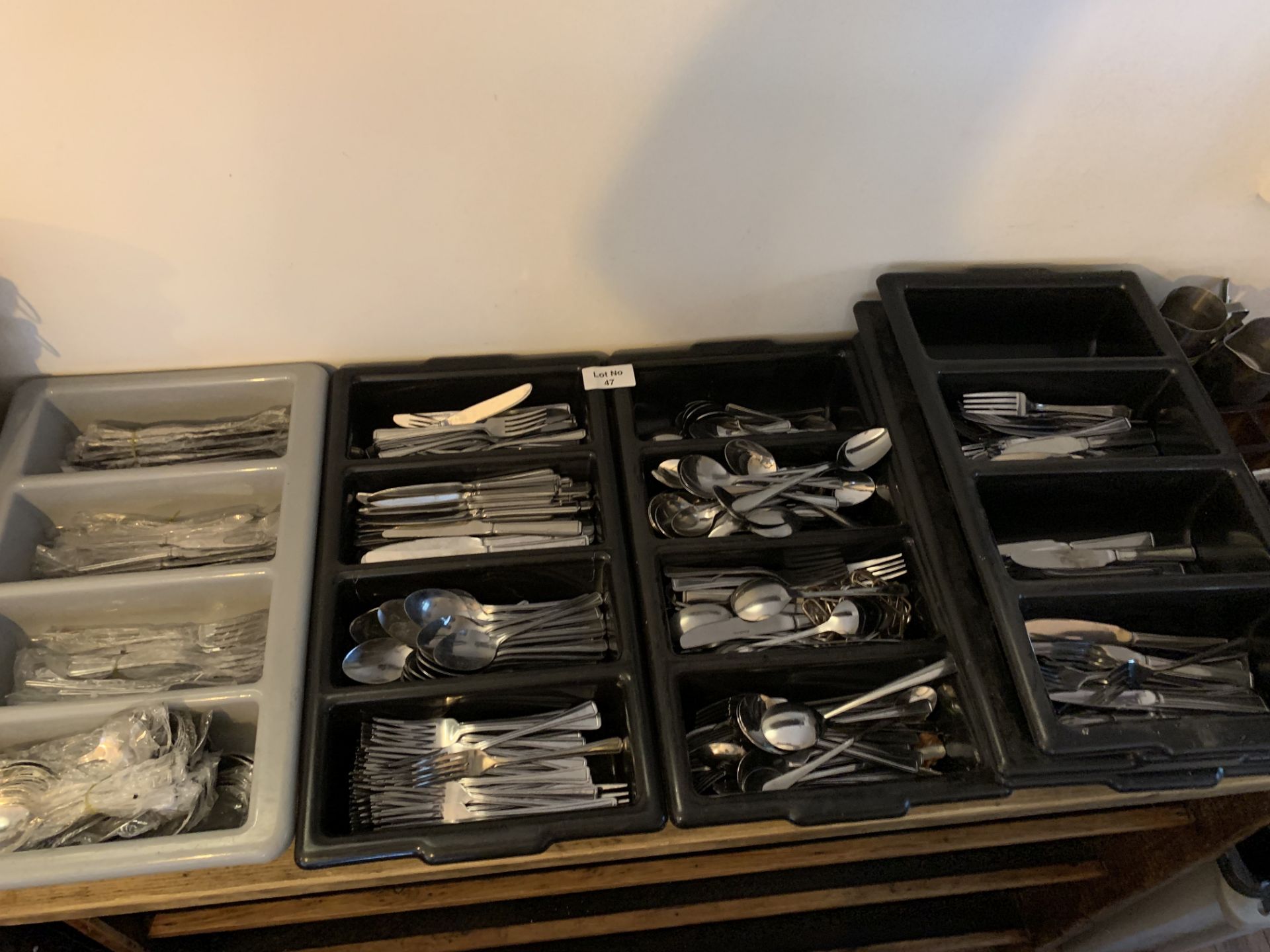 A large quantity of cutlery as per photos