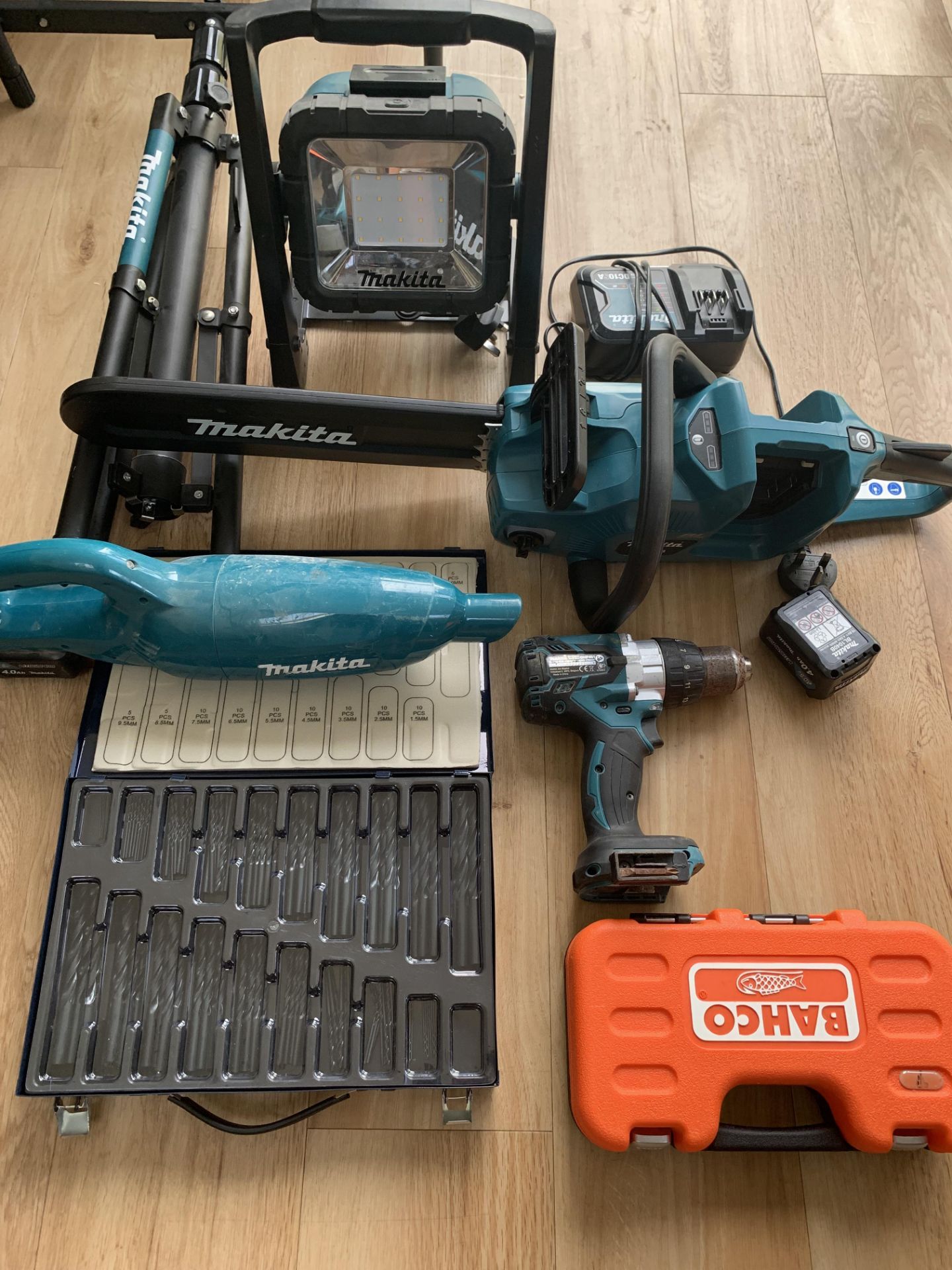 Assorted Makita Tools and hand Dyson