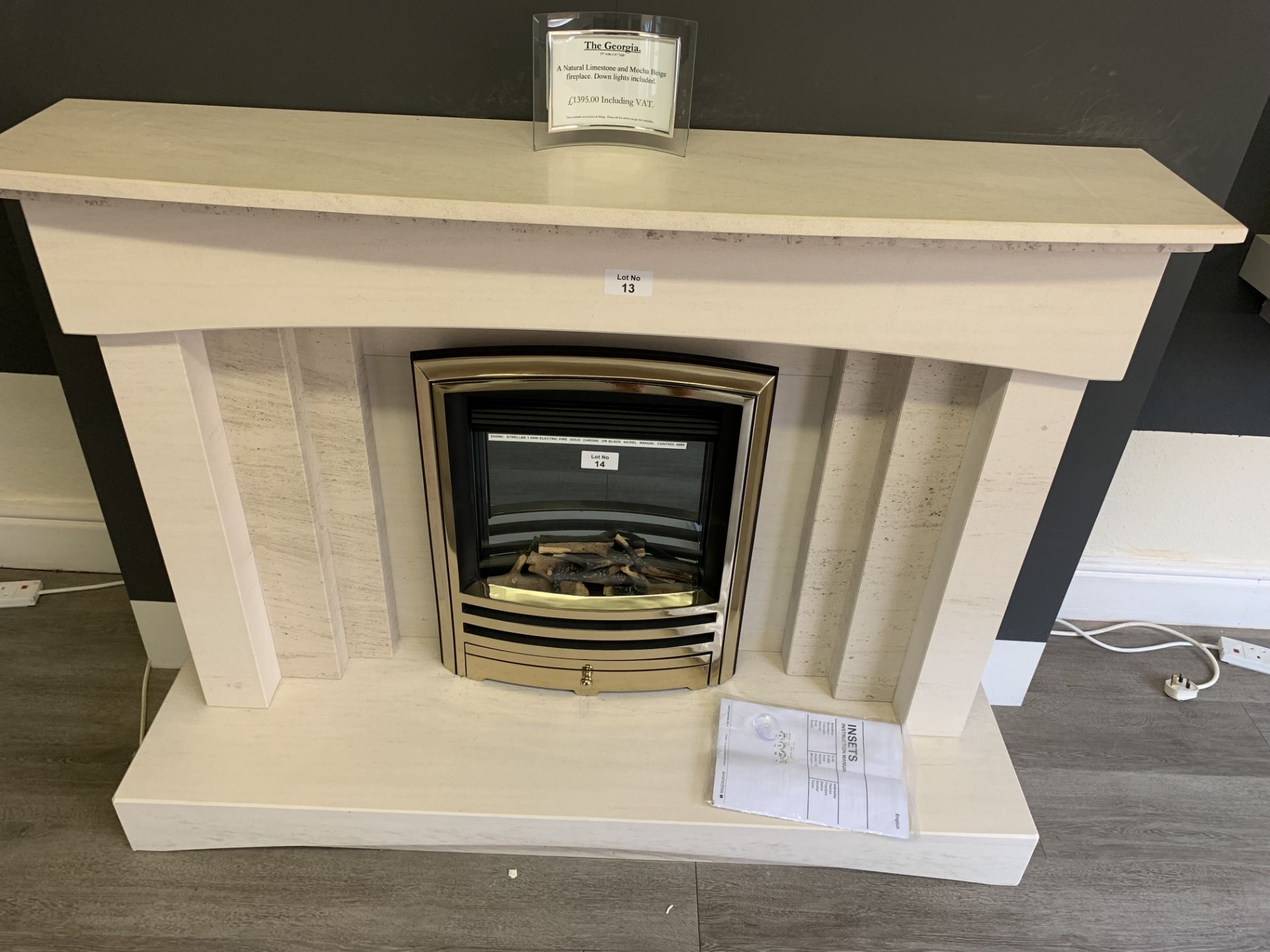 The Georgia fire surround w 55 x h 41” with down lights