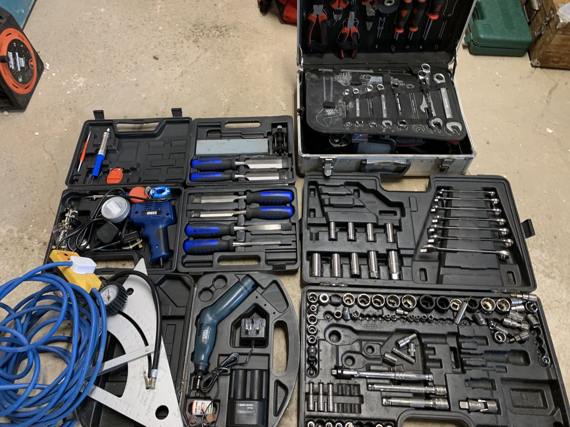 Quantity of cased tools, spanners, sockets, chisels, engraver etc as per photo