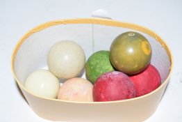 Box containing seven various billiard balls