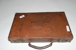Case containing Joyce Gardner's set of balls and a rare practice ball, the balls made of early