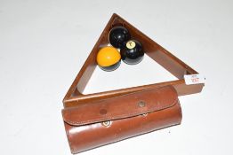 Mixed Lot comprising three billiard balls in a leather travelling case together with three further